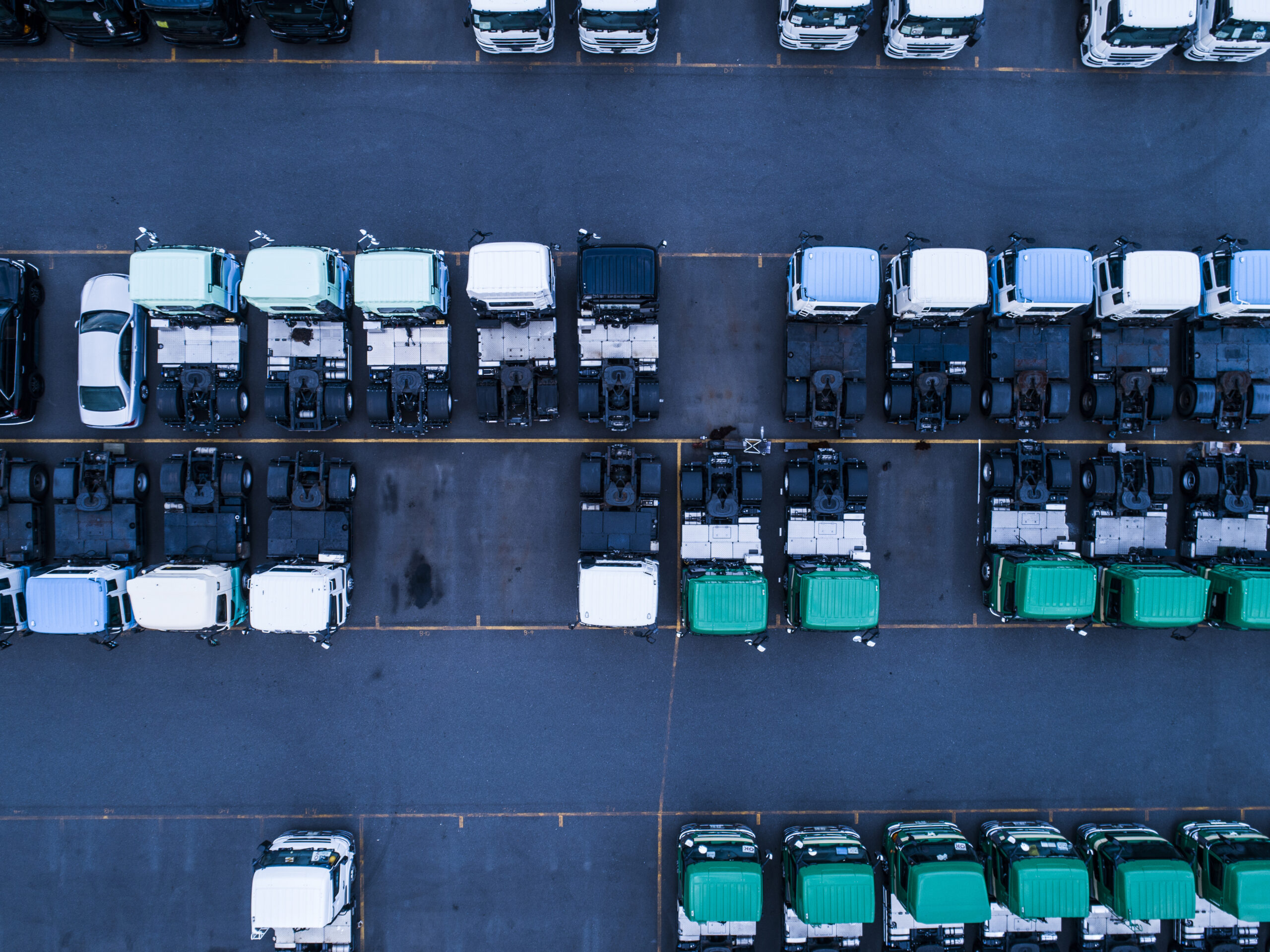 Many trucks in a parking lot